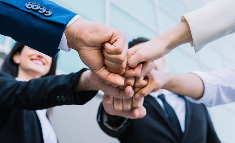 Professional team meeting discussing business strategy